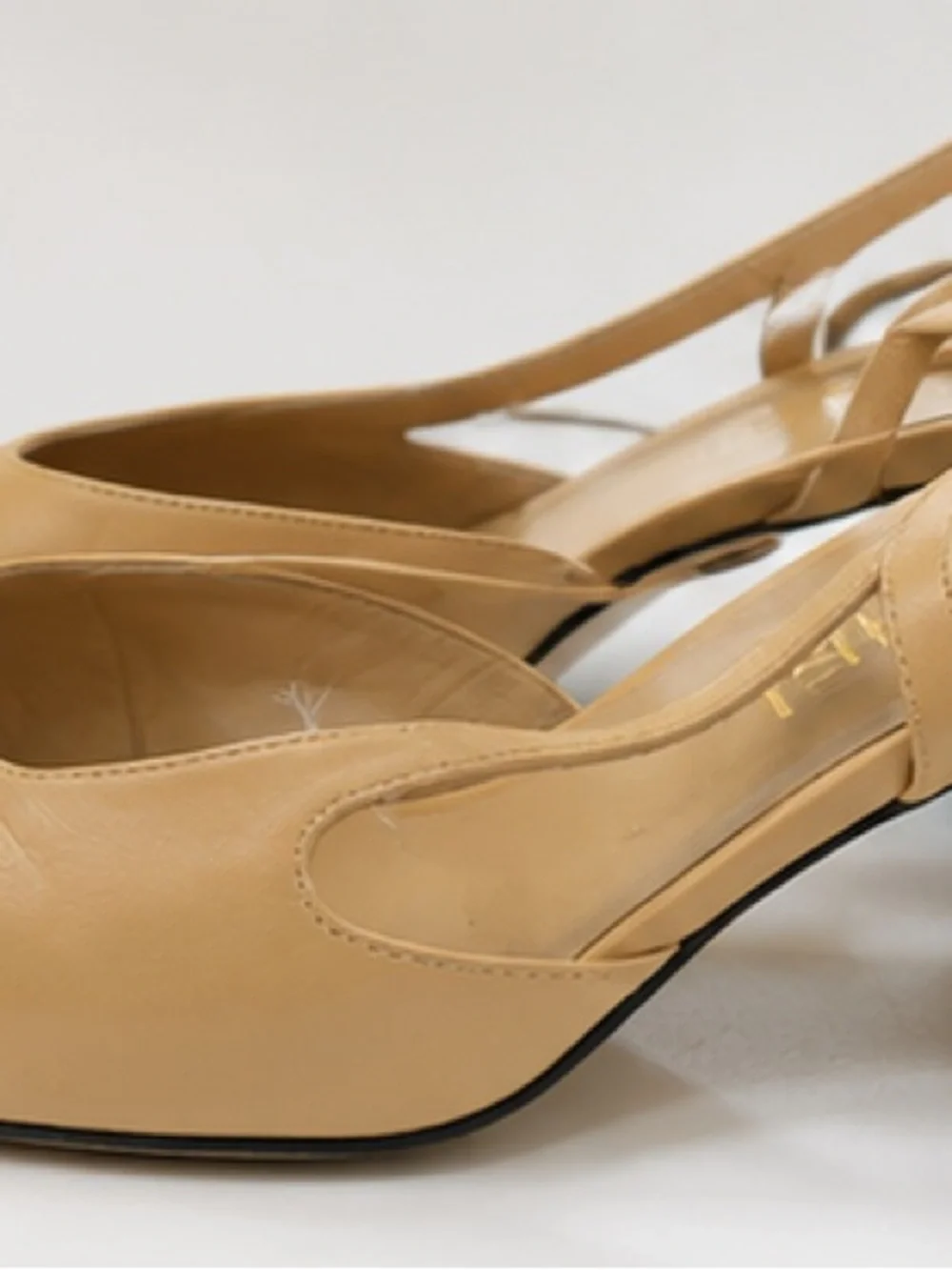 CHANEL Two-Tone Slingback Pumps in Tan and Black